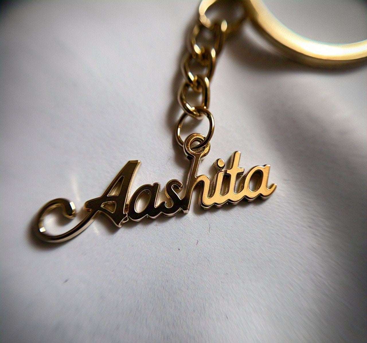 Custom engraved name keychain with black finish, stylish gift