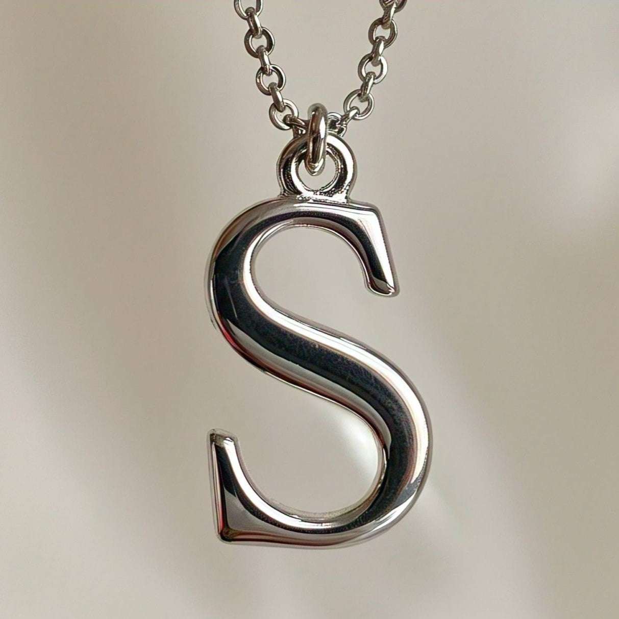 Elegant rose gold single-letter pendant, crafted jewelry piece