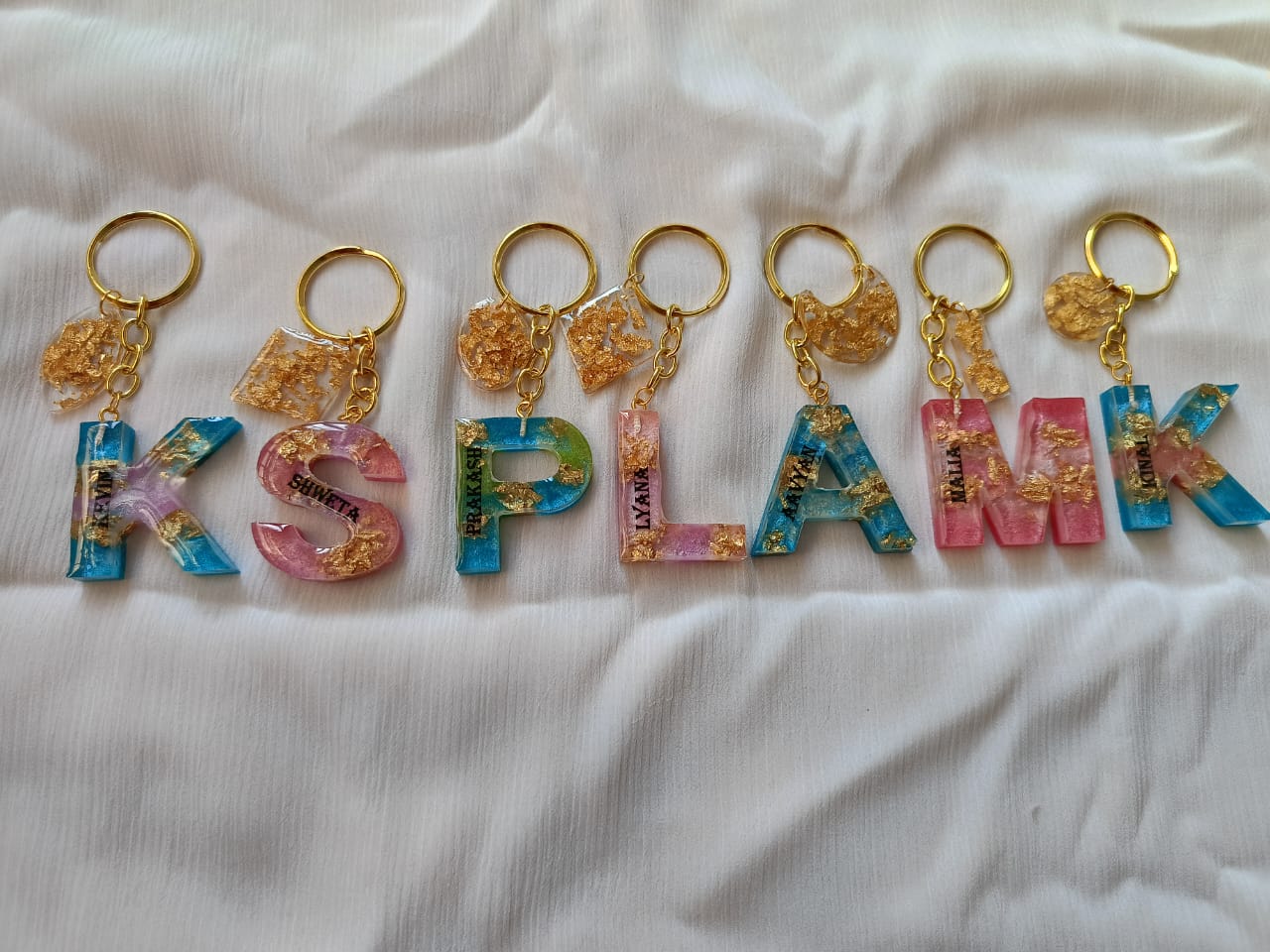 Colorful resin letter name keychain with gold flakes – unique handcrafted keyring