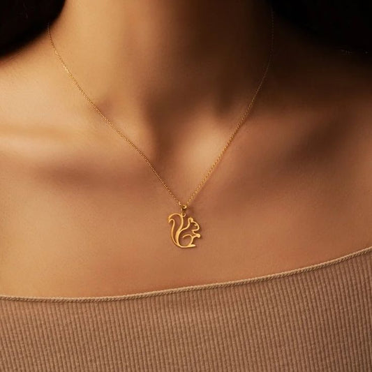 Dainty squirrel outline pendant on delicate chain by KraftedKey