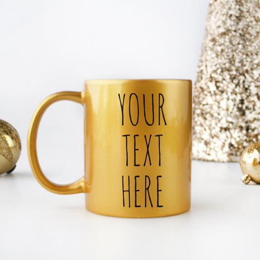 Experience luxury with our Custom Golden Mug—a premium 320ml ceramic masterpiece with a stunning metallic finish. Personalize using text, images and fonts!