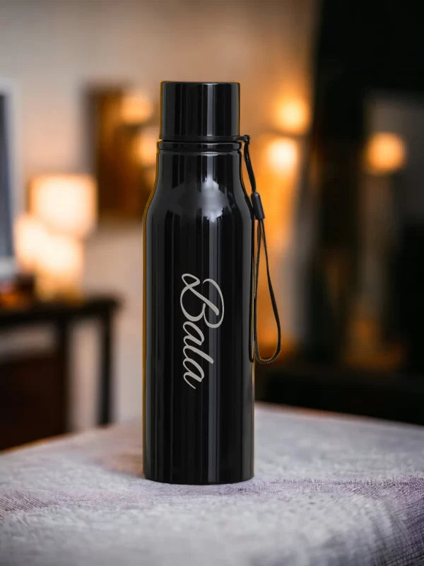 800 ml insulated black steel bottle customized with text, image, or design—spill-proof flip lid and sweat-resistant finish.