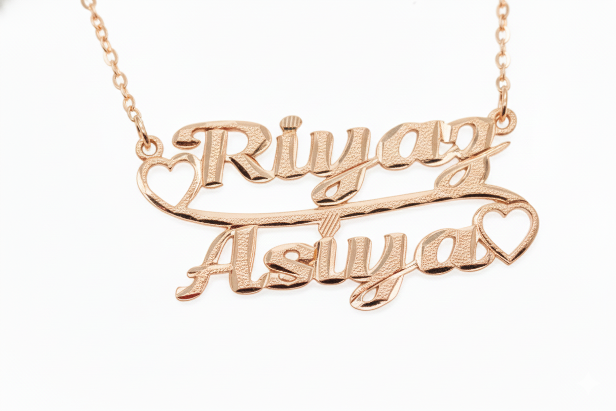 Close-up of Love Duo pendant with durable rose gold plating.