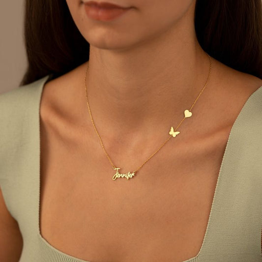 Custom engraved heart and butterfly necklace on delicate gold chain, ideal personalized gift